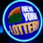 A bright, circular neon sign with a blue background, featuring the words 'New York Lottery' in bold white and yellow letters. The sign includes a colorful illustration of a landscape with green mountains, an orange-red sunset, and a bridge, all encapsulated within the circle.